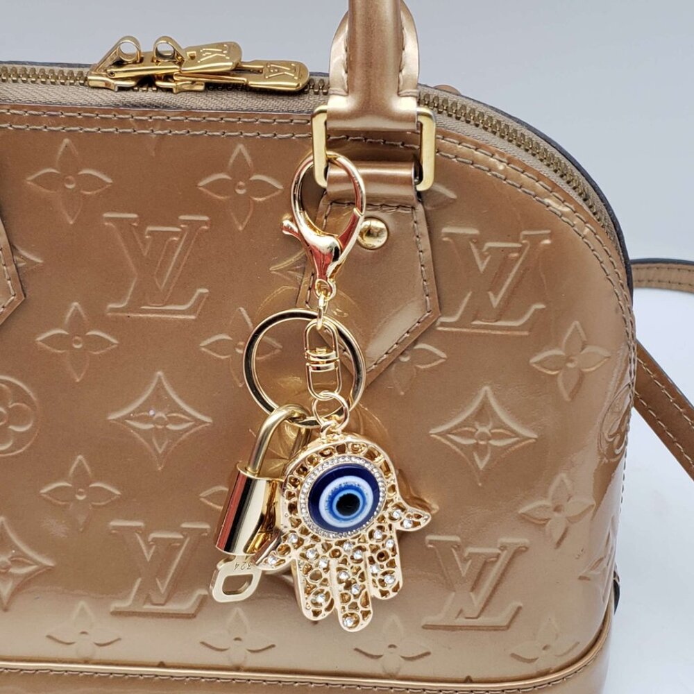 Louis Vuitton Gold Lock 🔒 Authentic LV Key + Unbranded Evil Eye Bag Charm - Picture 2 of 6